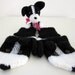 Hand knit Border Collie mittens gloves in black and white with polymer clay buttons