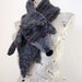 Hand knit wolf scarf in grey black with polymer clay buttons