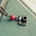 I heart my camera necklace.
