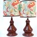 Pair of orange ceramic lamps with floral shades, OOAK