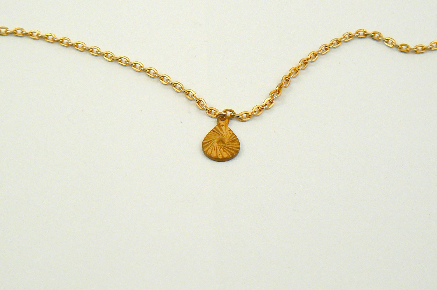 Vintage gold teardrop pendant