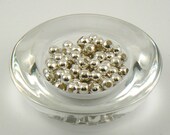 Shiny shiny silver coloured metal beads, destash