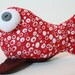 beady-eyed fish in red and white cotton print