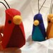 set of red, blue and yellow "banana bird" felt ornaments