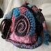 Tea Cozy made in Freeform Crochet and knitting - blue, pink, and charcoal with a hat