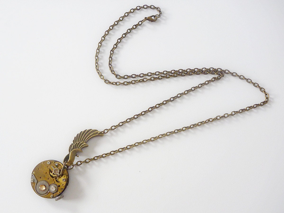 Steampunk Necklace, vintage watch movement with angel wing and swarovski - Timeless Relic