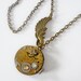 Steampunk Necklace, vintage watch movement with angel wing and swarovski - Timeless Relic
