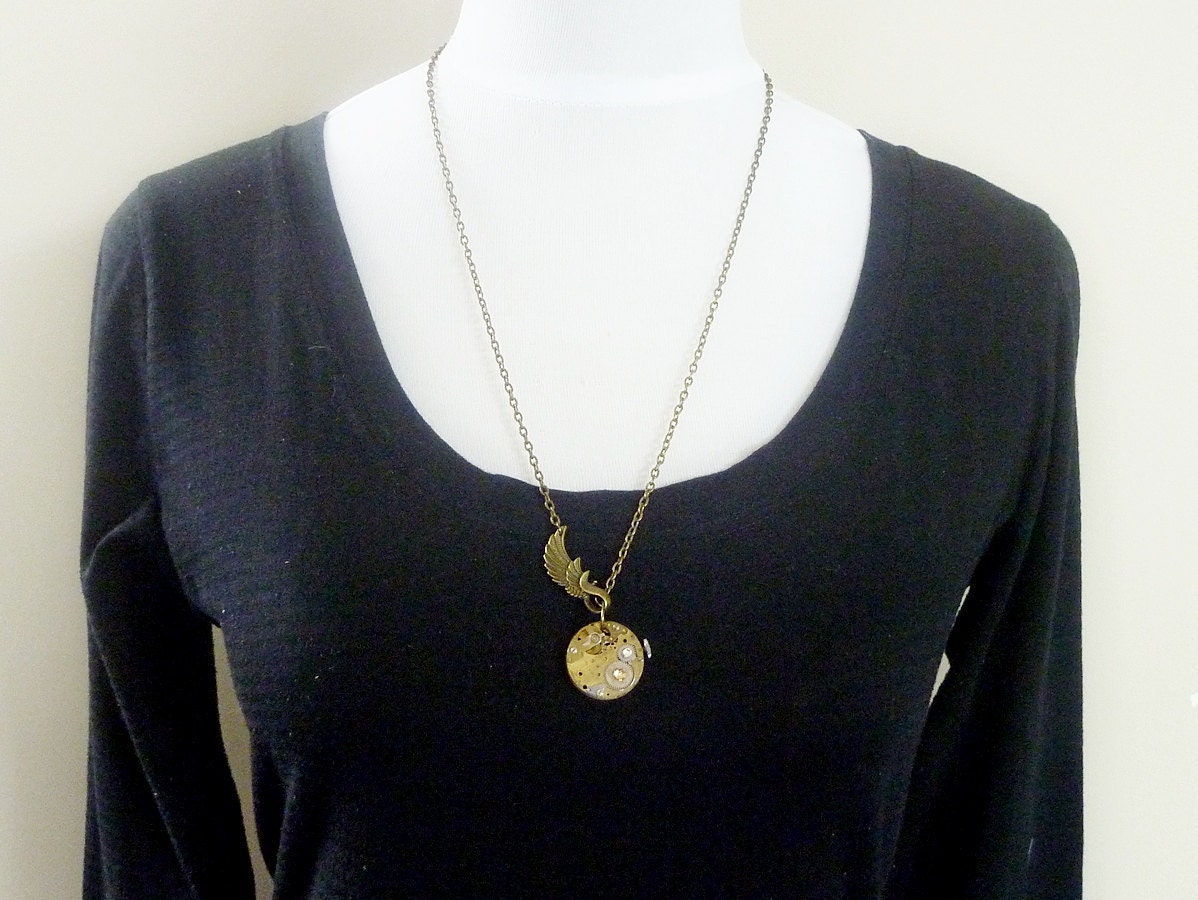 Steampunk Necklace, vintage watch movement with angel wing and swarovski - Timeless Relic