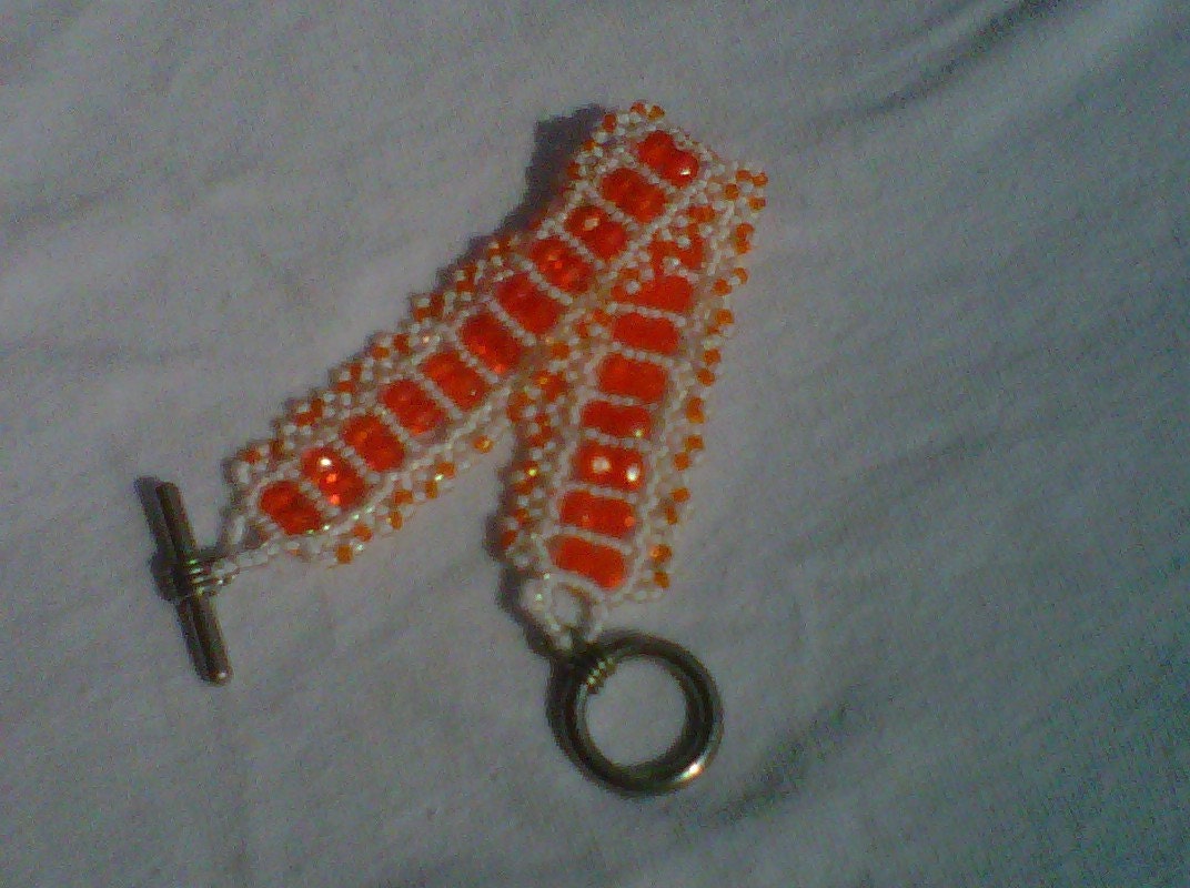 Orange and White Beaded Bracelet