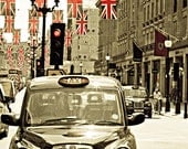 London Photography, fine art photograph of a London cab with union jack flags, Olympics