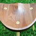Stool made in sustainably sourced black walnut.