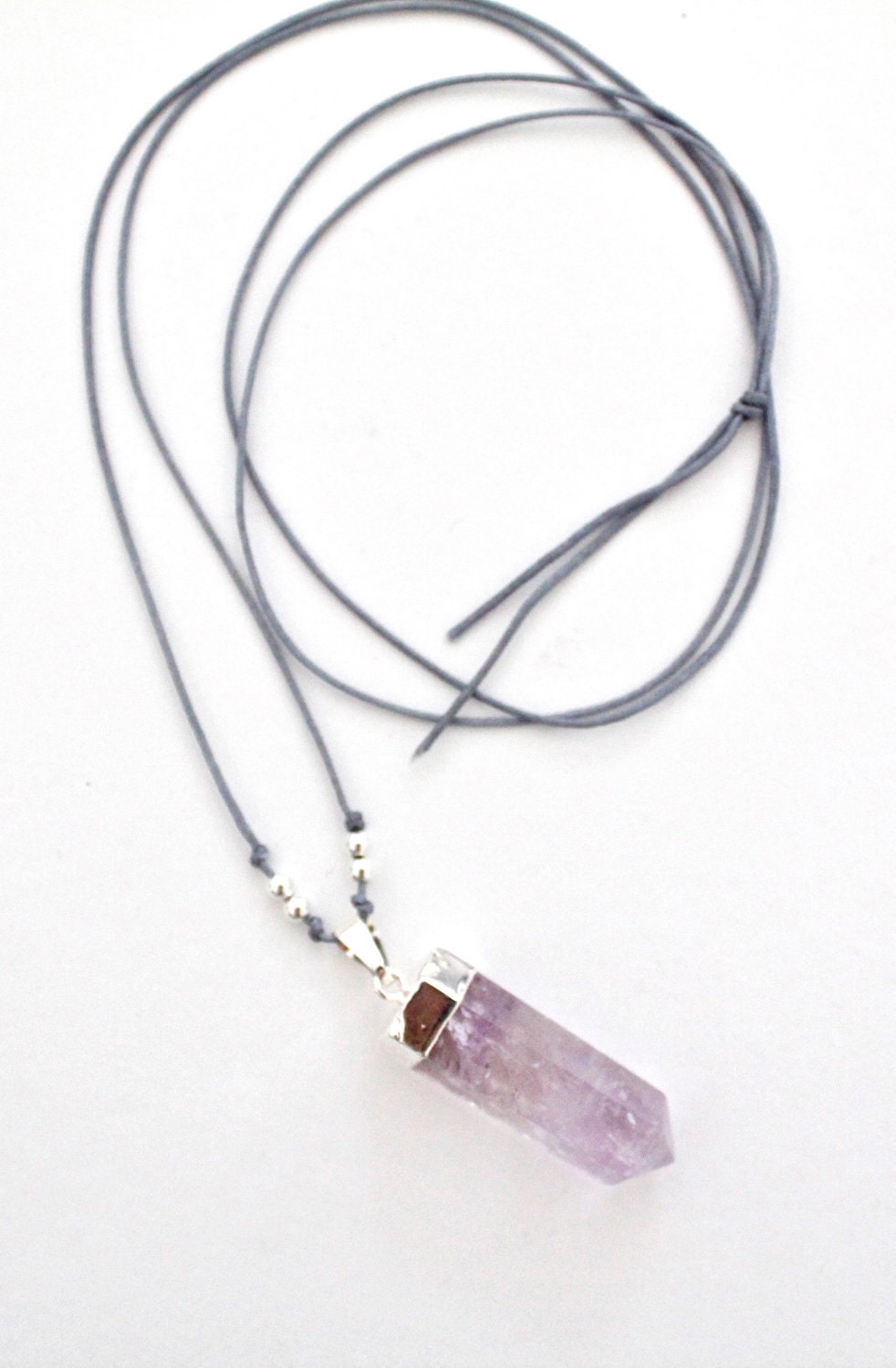 Prabha- quartz ornament on silk string