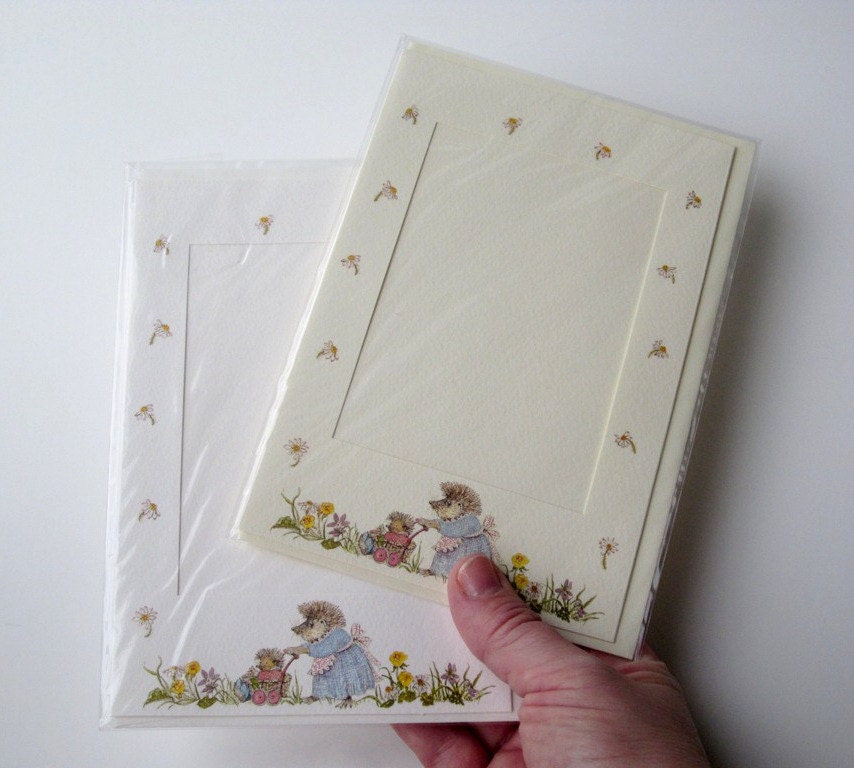 2 die cut card blanks for framing photographs, embroidery or cross stitch inserts ... cream and white with pretty Hedgehog designs