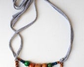 Color Pop Necklace in Hazelnut, Sweet Basil, Blue & Grey . Non-toxic Beads with a Jersey Tie . Fashionable and baby-friendly