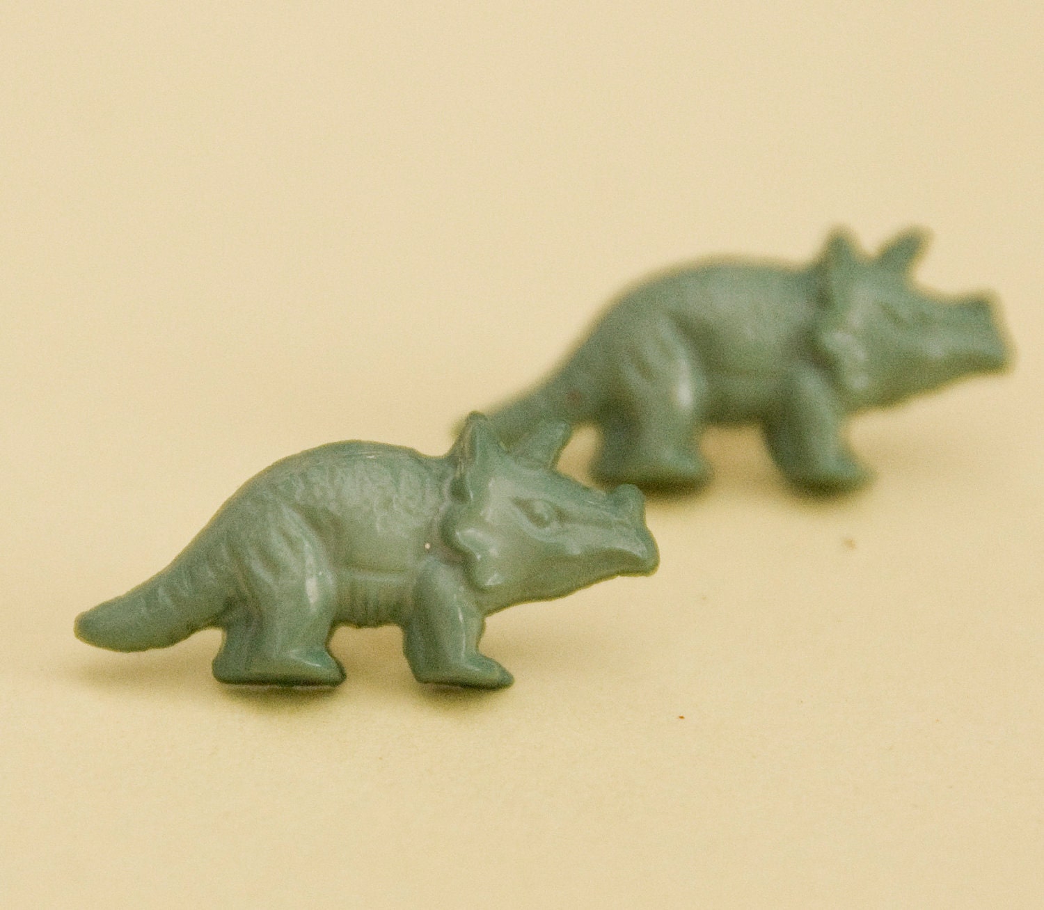 Green Triceratops Dinosaur earrings
