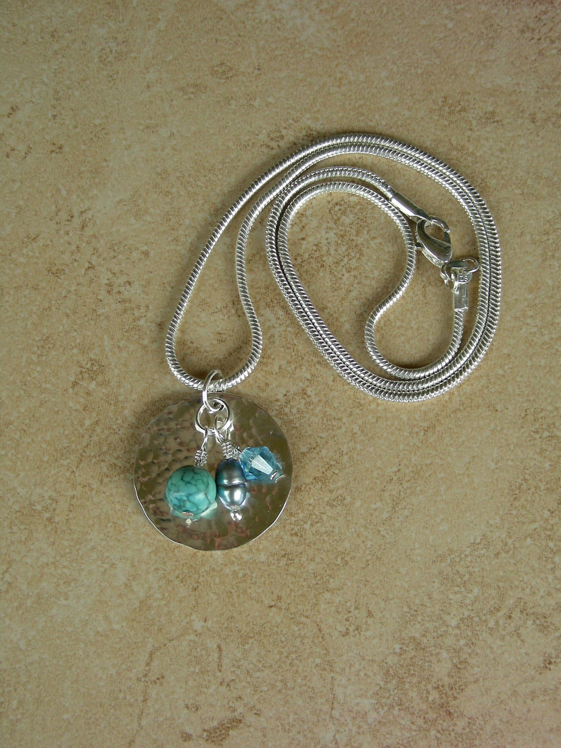 Sterling silver charm cluster necklace hammered disc, turquoise, pearl and swarovski