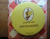 whitman's candy tin can
