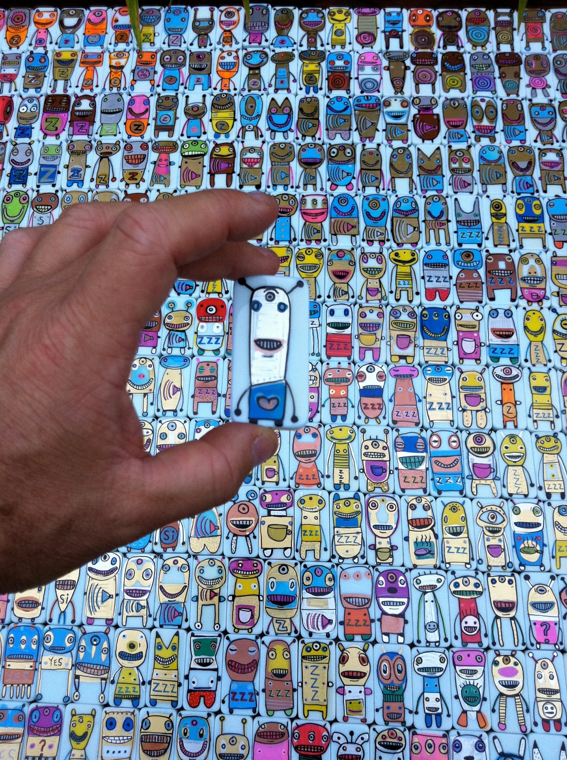 Love Bots: a tiny domino robot that loves you unconditionally