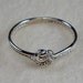 Mini Celtic Double Love Knot with Shinny and Twisty Argentium Silver