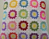 colorful circles in white granny squares cushion cover