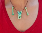 little turqoise demon skull and bone necklace