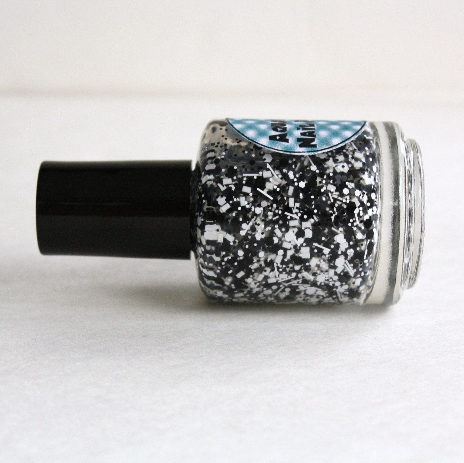 Black and white topcoat glitter nail polish Me Too
