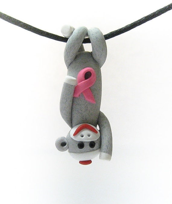 READY TO SHIP: Sock Monkey Pendant Clutching Pink Awareness Ribbon in Traditional Gray Polymer Clay