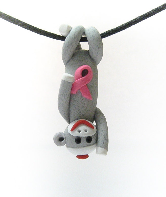 READY TO SHIP: Sock Monkey Pendant Clutching Pink Awareness Ribbon in Traditional Gray Polymer Clay