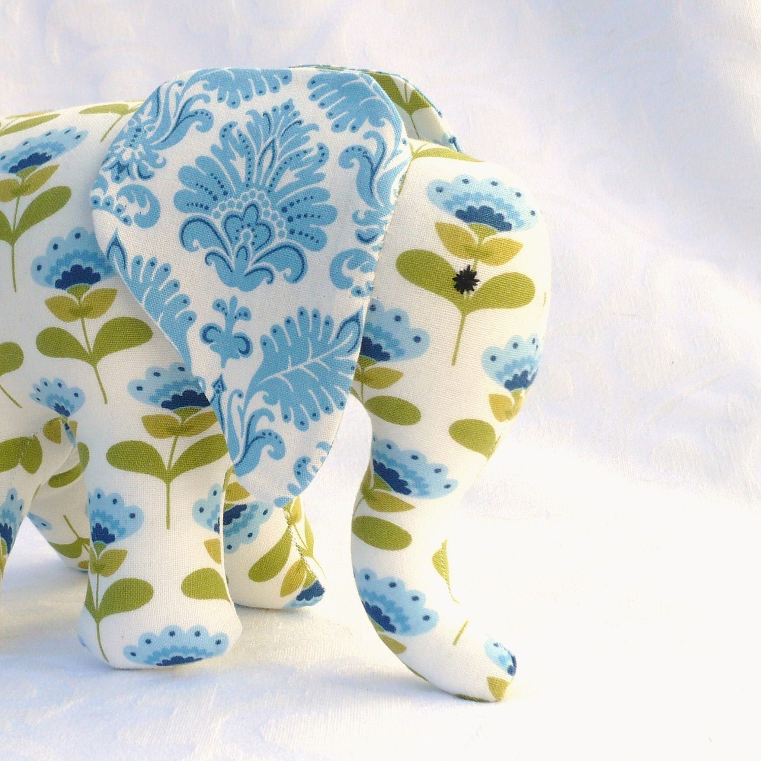 Elephant toy with pacifier tail and sound, blue and white. Made to order.