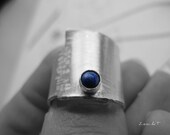 Sterling silver ring with denim blue lapis, wide band made in your size, hammered, simple.