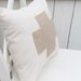 Burlap Swiss Cross on muslin pillow