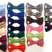 point collar in choice of color or print and interchangeable bow tie for cat