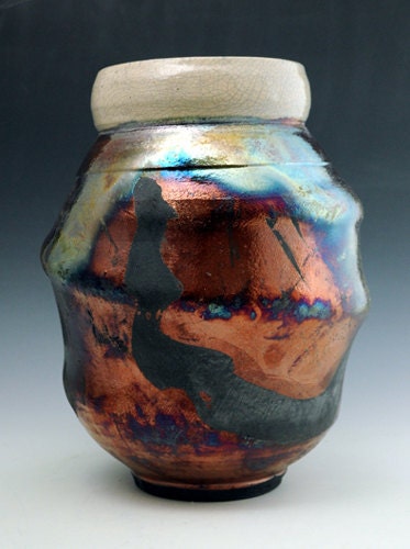 raku vase with copper luster, crackle glaze, and brushwork