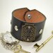 Black Leather Cuff Bracelet with Key Hole Charm and Silver Studs