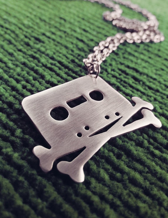 Tape and Crossbones Pendant Necklace The Pirate Bay Cassette