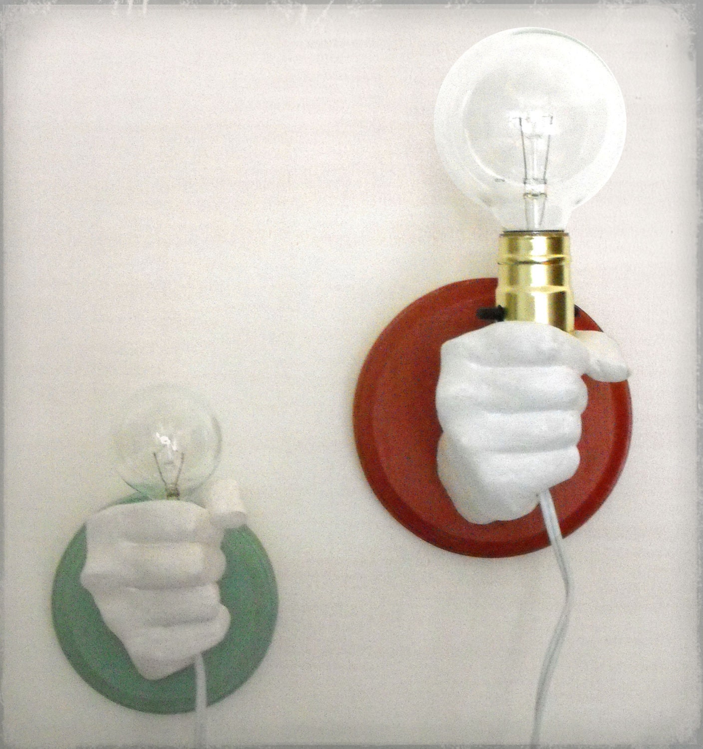 Hand Holding Bulb Wall Lamp (Red)
