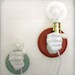 Hand Holding Bulb Wall Lamp (Red)