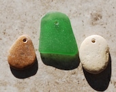 White And Light Brown Beach Stones With A Green Piece Of Seaglass Top Drilled