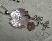 Silver necklace with pink flowers and bee