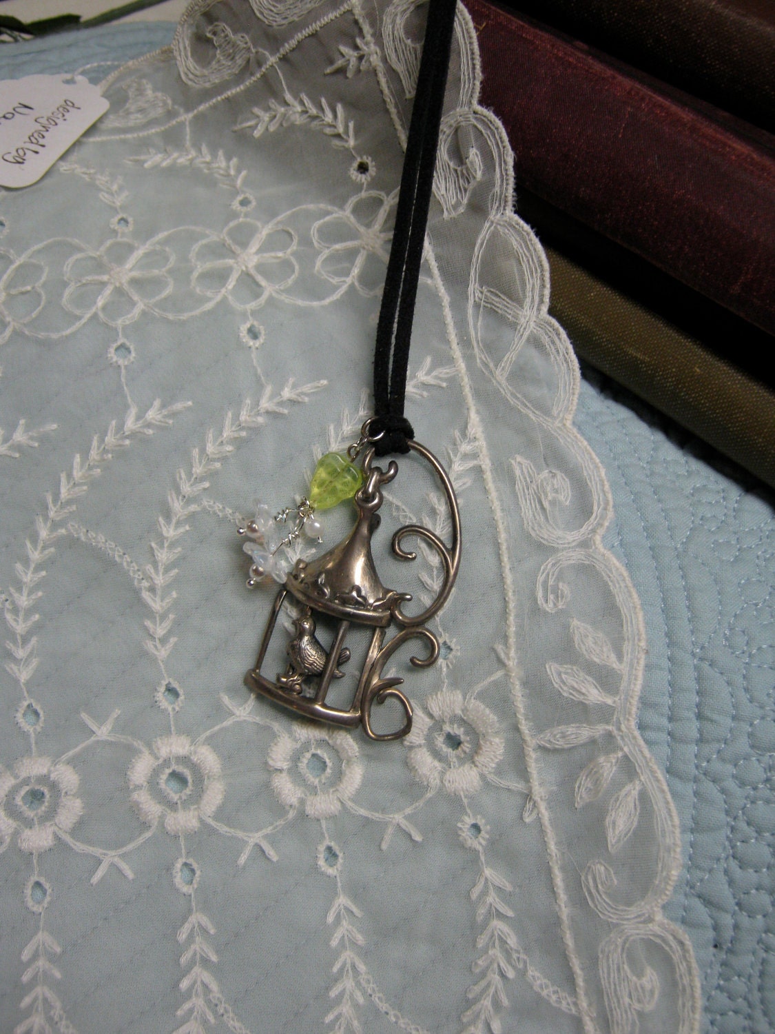 Sterling bird in a cage pendent necklace