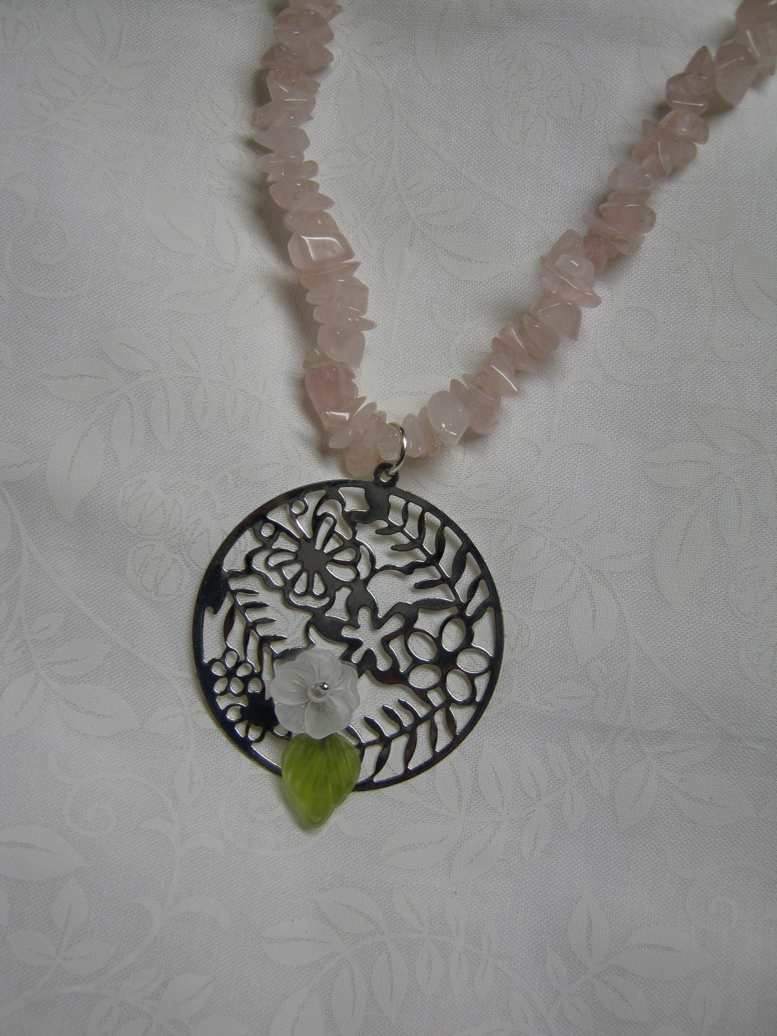 Silver butterflies and flowers pendant