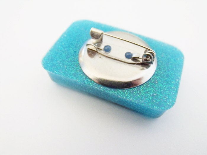 Space ship blue glitter badge pin