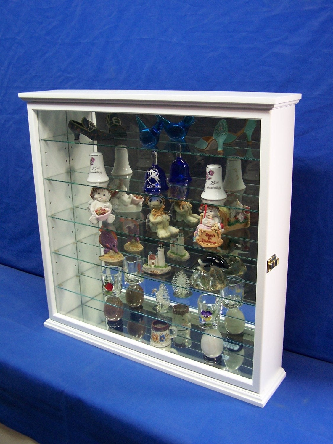 white wall curio cabinet