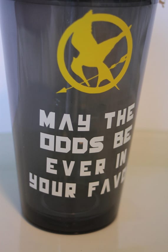 HUNGER GAMES insulated tumbler. May the Odds be Ever in your Favor.  Smoke tumbler with white and gold.Personalize.