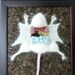 Knitted Lab Rat, dark cork background