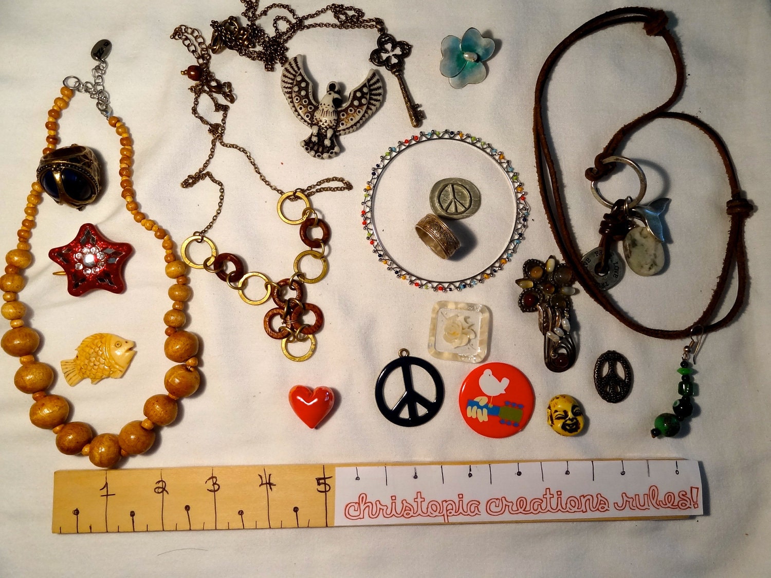 collection of hippy 60s jewelry and pieces