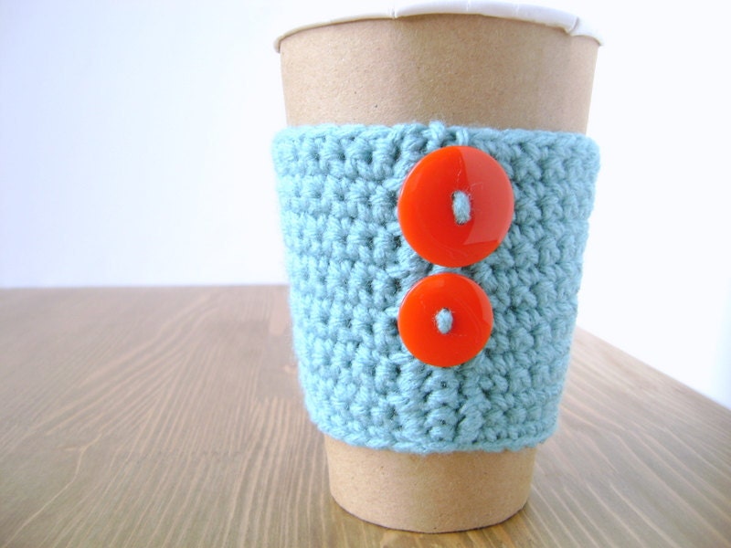 Coffee cup cozy, aqua with red buttons by The Cozy Project