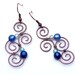 Earrings - Aotearoa - Copper & Polarisbeads ORANGE and RED - New Zealand Maori Symbols plafully wrapped out of oxidized copper wire