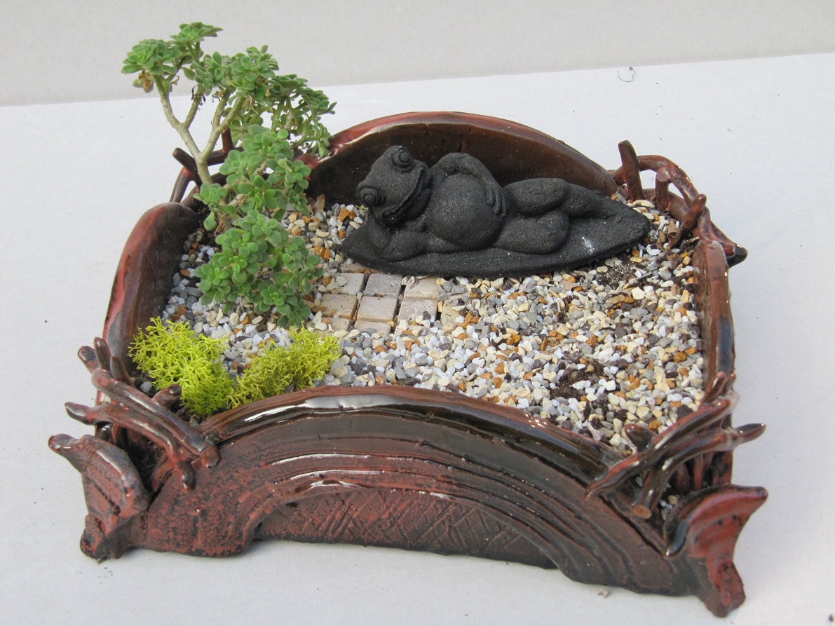 Tiny stone frog