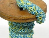 Boucle Lipcord in turquoise, yellow and green